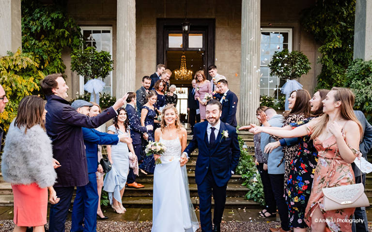 Confetti photo on the front steps of Davenport House 