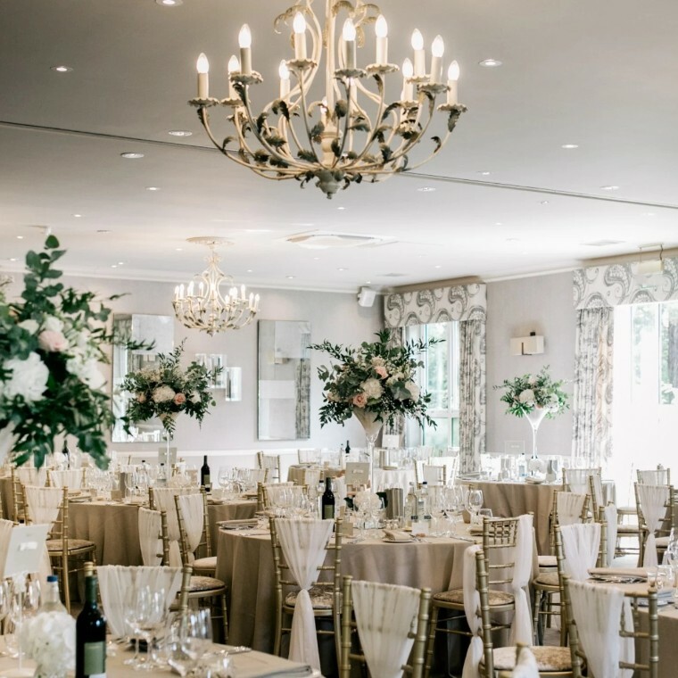 wedding breakfast set up at the vineyard hotel in Berkshire.