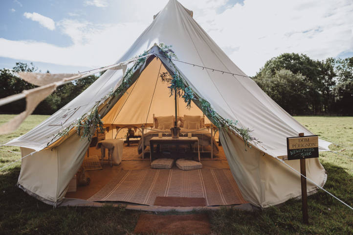 Cream Bell tent with large double bed inside