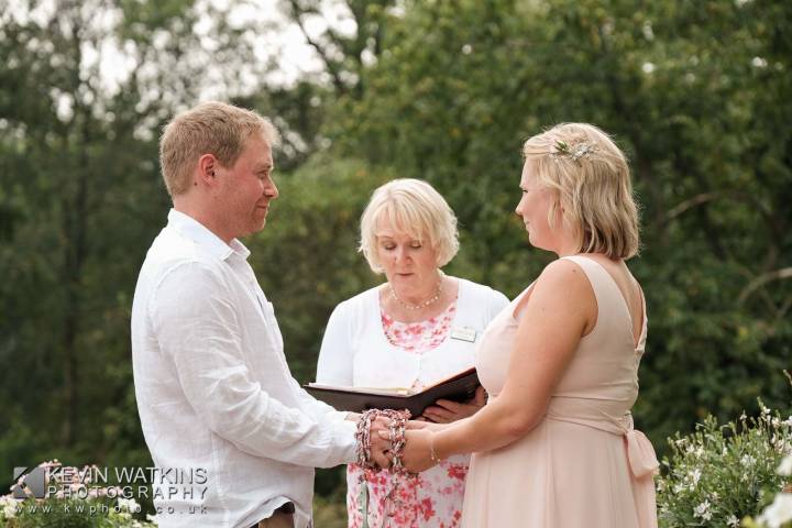 Handfasting Wedding Ceremony outdoors in a private garden