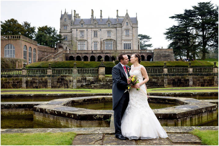Couple Kissing Outside Lilleshall House & Gardens Venues