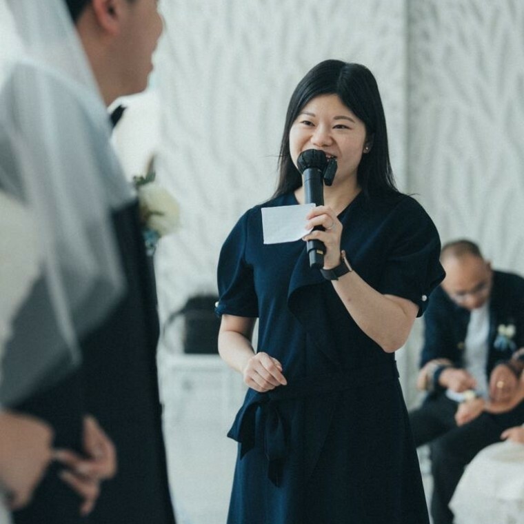 Trilingual wedding celebrant officiating a marriage ceremony in Hong Kong and UK