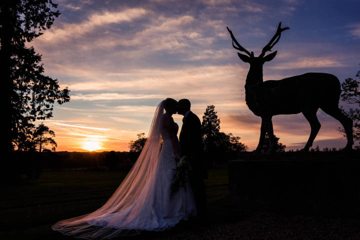 Couple at sunset on the ground of Gosfield Hall