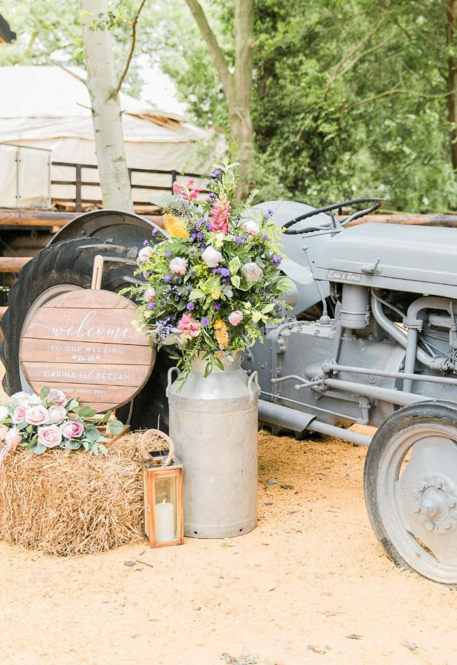 grey vintage tractor at entrance of bennetts willow barn wedding venue worcestershire